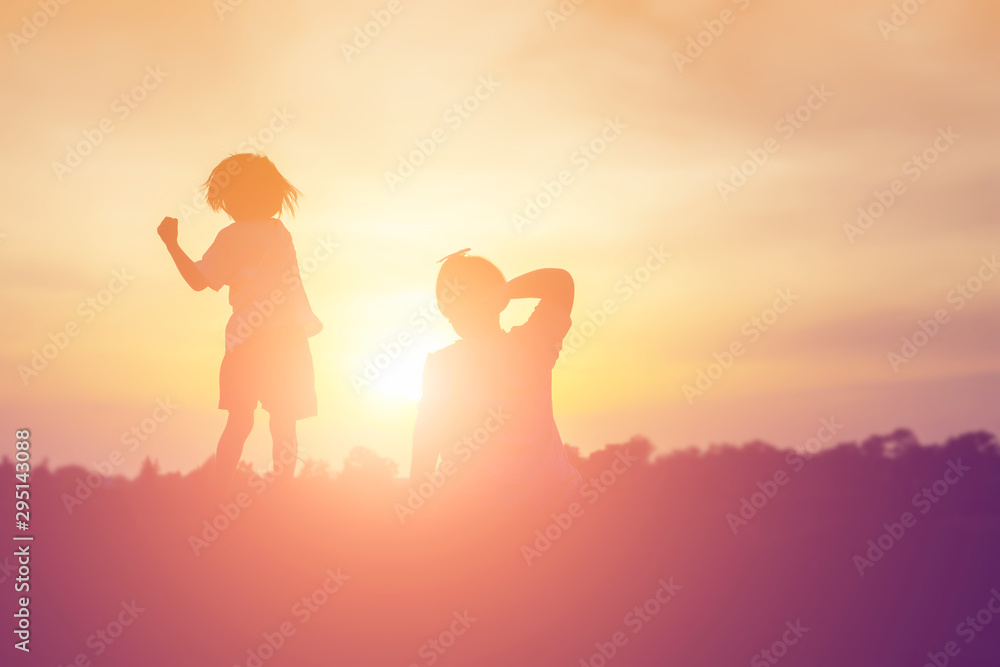 kid silhouette,Moments of the child's joy. On the Nature sunset kid silhouette,Moments of the child's joy. On the Nature sunset