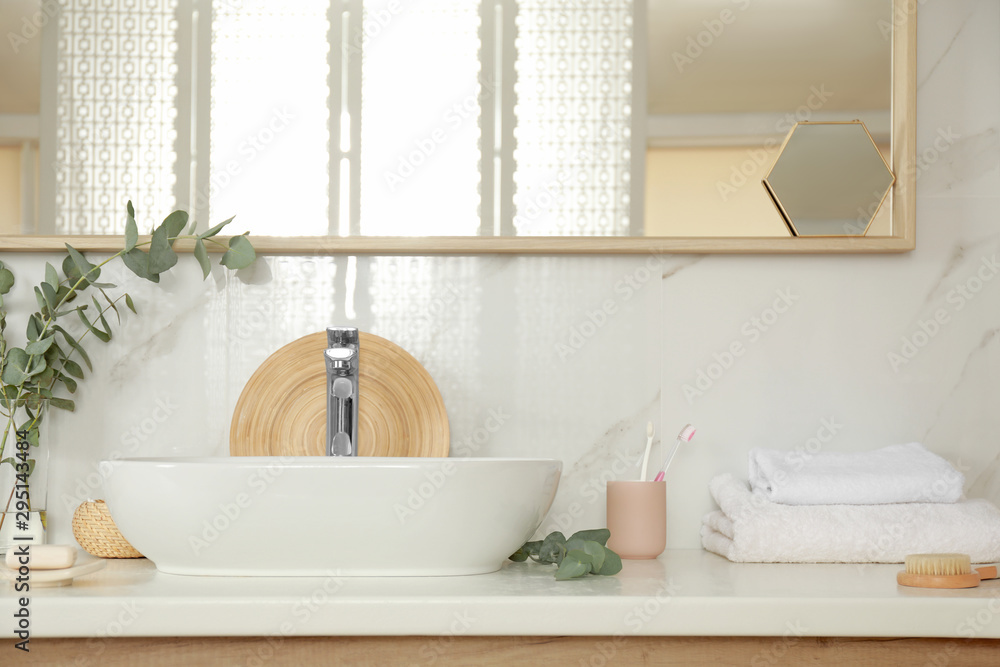 Fototapeta premium Stylish white sink in modern bathroom interior