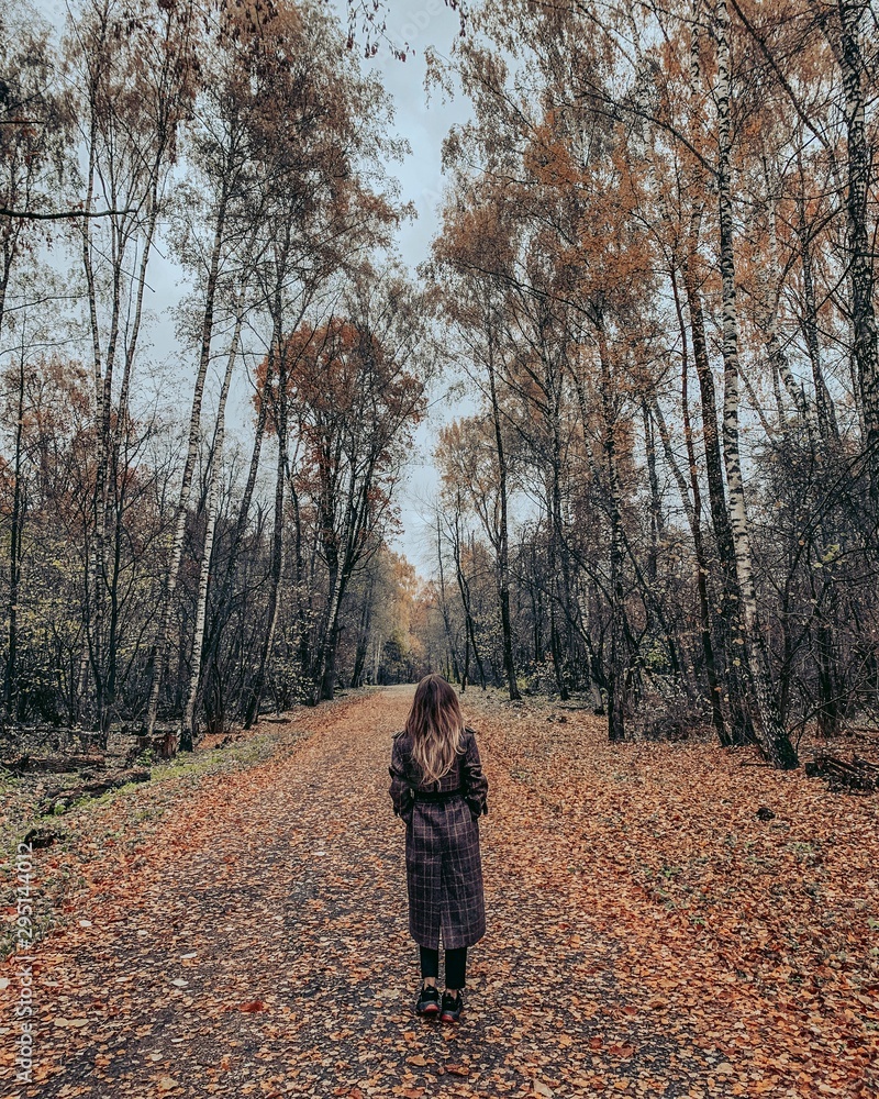 woman walking in forest