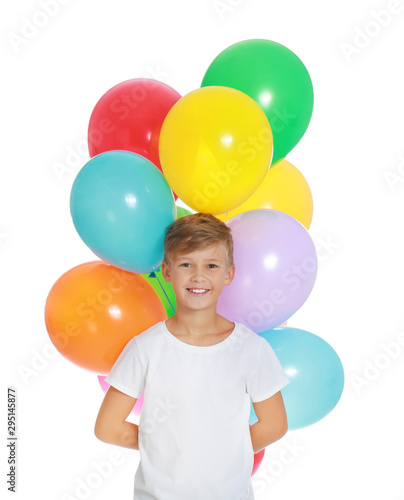 Little boy holding bunch of colorful balloons on white background