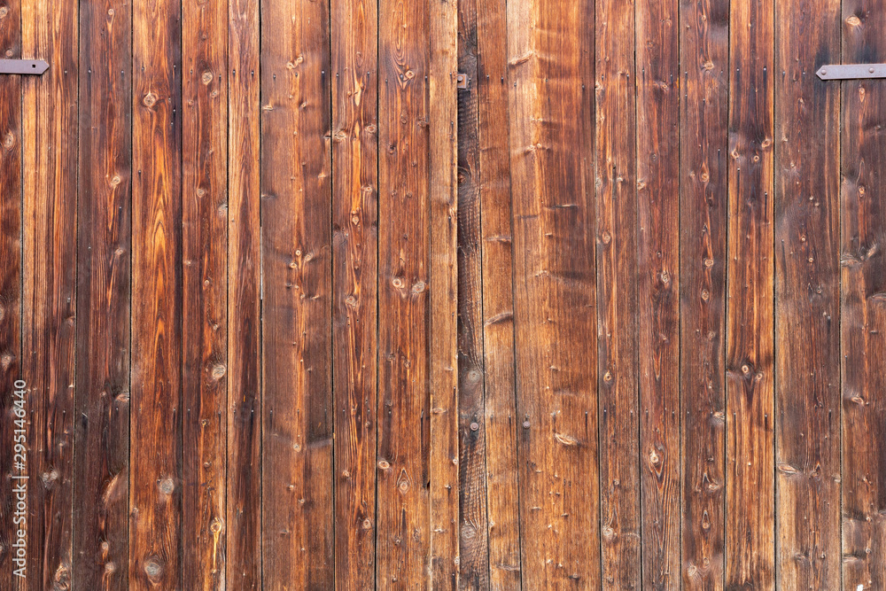 Naklejka premium The old wooden door - grunge background texture for design