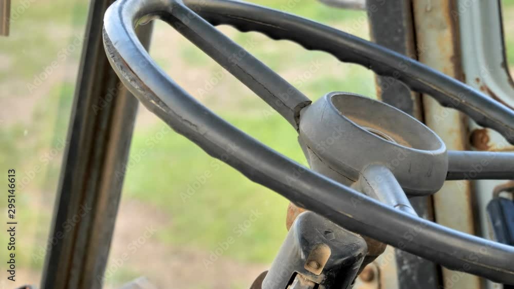 Closer look of the black steering wheel of the truck Closer look of the black steering wheel of the truck
