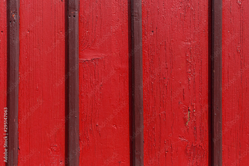 The old red wood texture with natural patterns The old red wood texture with natural patterns