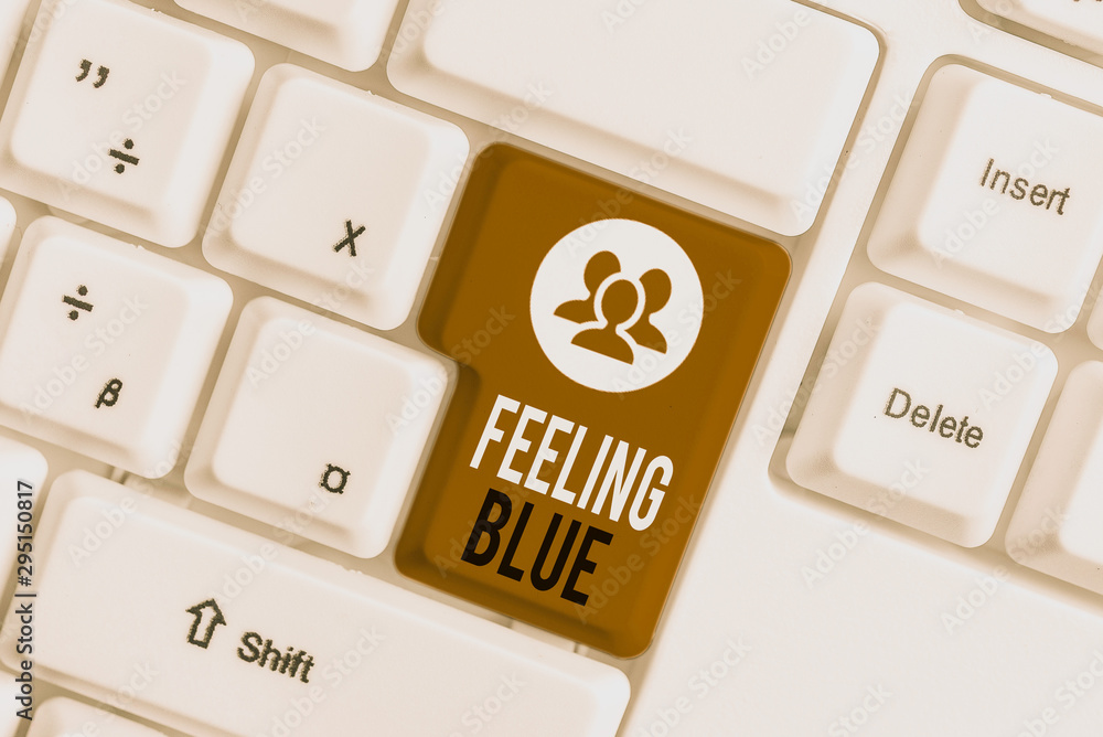 Handwriting text writing Feeling Blue. Conceptual photo Feeling of desperation because of sadness or missing someone White pc keyboard with empty note paper above white background key copy space Handwriting text writing Feeling Blue. Conceptual photo Feeling of desperation because of sadness or missing someone White pc keyboard with empty note paper above white background key copy space