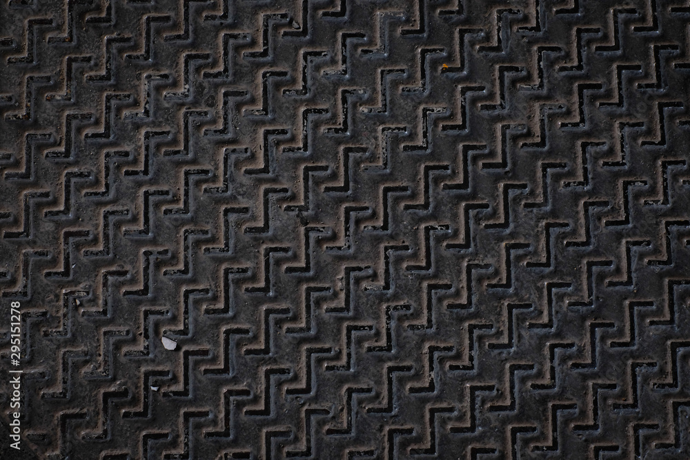 metal texture pattern, ribbed cast iron surface, textured black background , wall for dark backdrop , loft style interior. metal texture pattern, ribbed cast iron surface, textured black background , wall for dark backdrop , loft style interior.