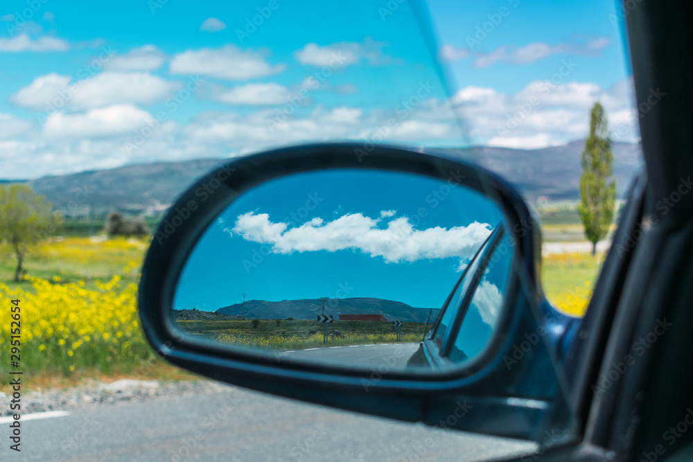 mirrored cloud of a car