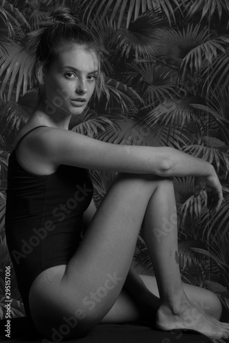 black and white photo of young woman  in black bodysuit torzo art posing beautiful skin fashion model   © oreans