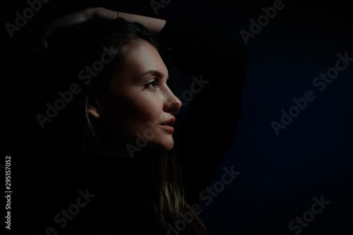 portrait of fashion model beautiful girl with freckles in studio, close up, beautiful girl young woman