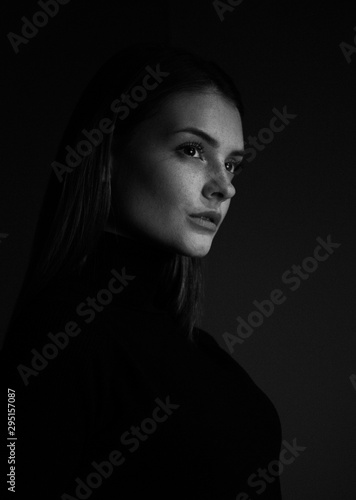 portrait of fashion model beautiful girl with freckles in studio, close up, beautiful girl young woman