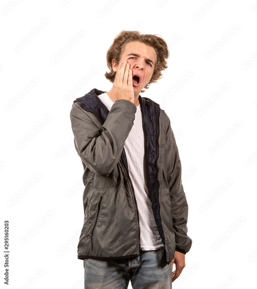 Funny teenage boy looking shocked with his hand on his face in disbelief! Funny teenage boy looking shocked with his hand on his face in disbelief!