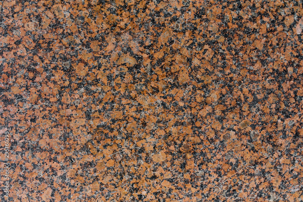 Beige brown granite background with black grain Beige brown granite background with black grain