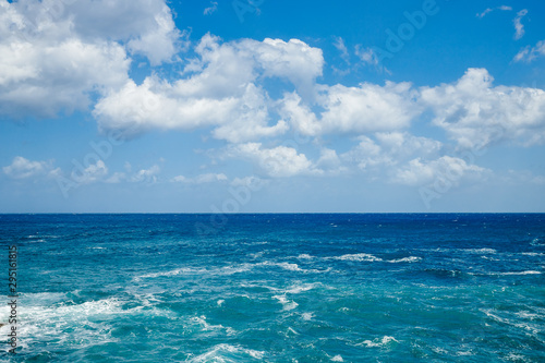 Natural background blue sea with waves, azure clear water beach