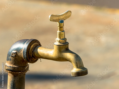 old chrome tap, with selective focus.