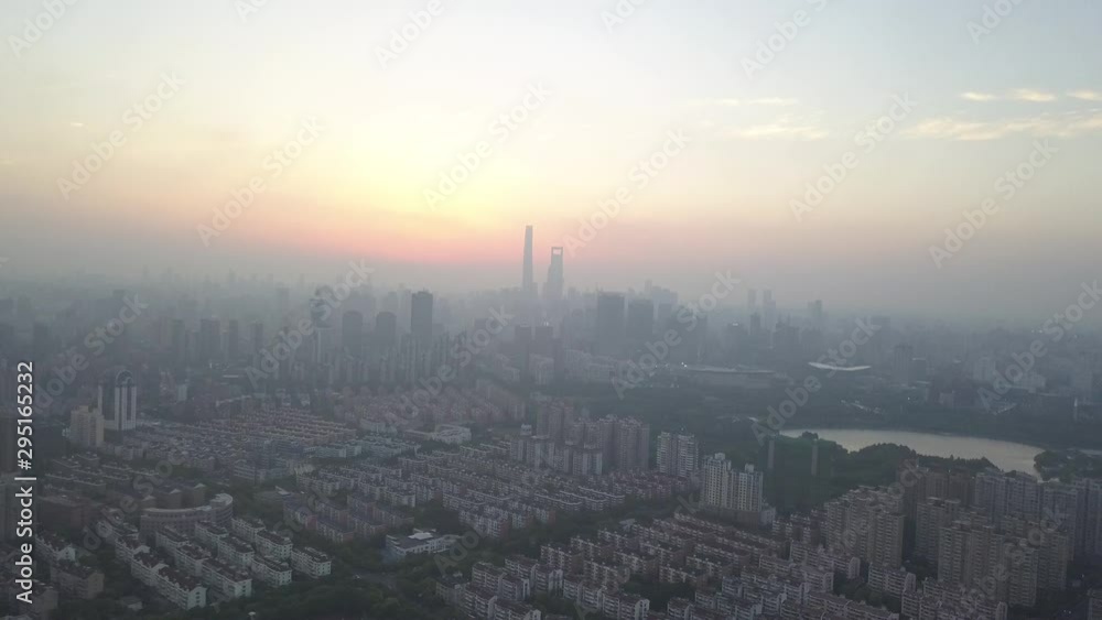 Stunning twilight aerial panorama of Shanghai downtown building silhouettes. Drone shot. Extreme wide shot. Stunning twilight aerial panorama of Shanghai downtown building silhouettes. Drone shot. Extreme wide shot.