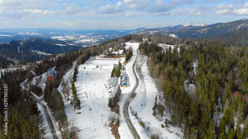 Aerial view Biathlon. Winter sports in the mountains. Cross country skiing in the Ukrainian Carpathians photo