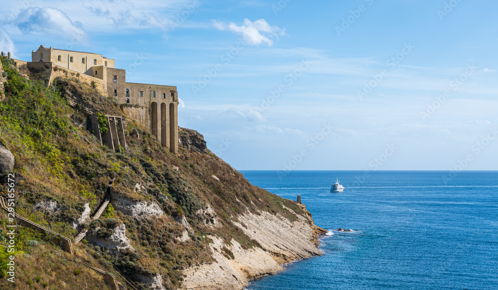 Panoramic sight of the beautiful island of Procida with the castle, near Napoli, Campania region, Italy.