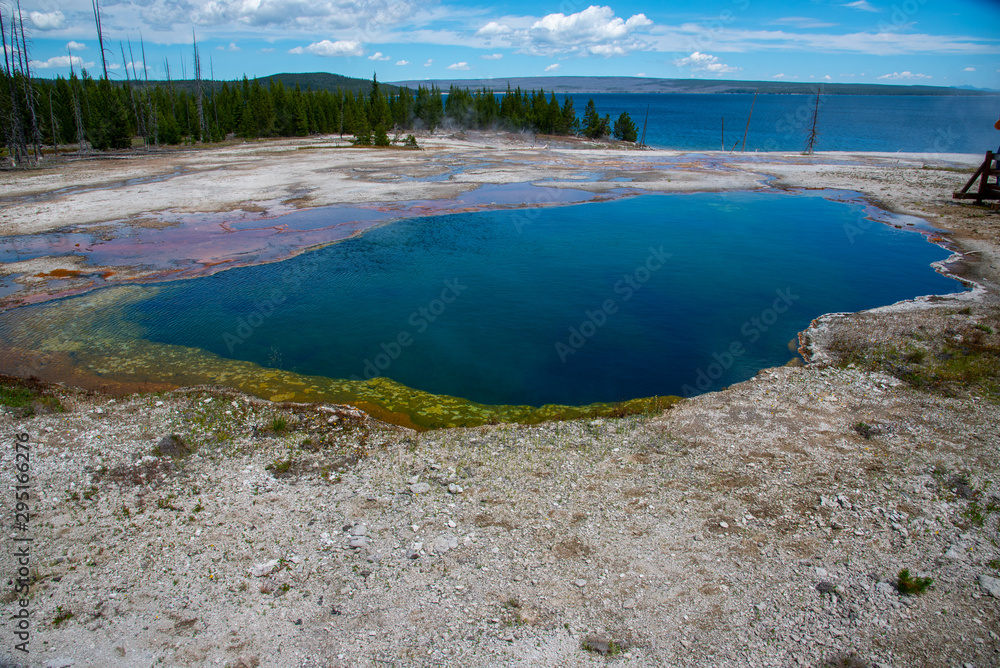 Geothermal feature at west thumb at Yellowstone National Park (USA) Geothermal feature at west thumb at Yellowstone National Park (USA)