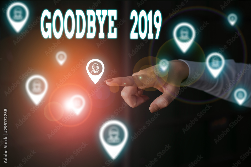 Writing note showing Goodbye 2019. Business concept for expressing good wishes during parting at the end of the year Woman wear formal work suit presenting presentation using smart device Writing note showing Goodbye 2019. Business concept for expressing good wishes during parting at the end of the year Woman wear formal work suit presenting presentation using smart device