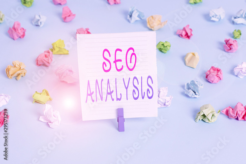 Conceptual hand writing showing Seo Analysis. Concept meaning tool helps showing to study on how to improve a website ranking Colored crumpled papers empty reminder blue floor clothespin © Artur