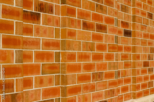 Orange color brick wall texture with 1/3 offset stagger brickwork pattern