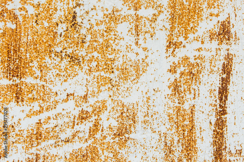 Rusty orange texture on the wall.