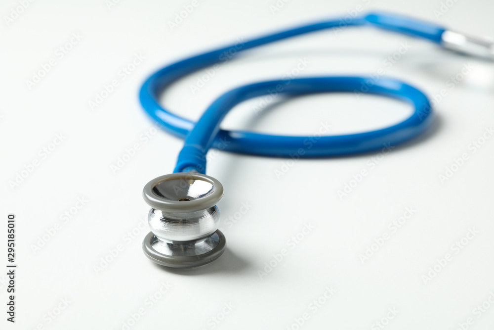 Stethoscope on white background, space for text and close up Stethoscope on white background, space for text and close up