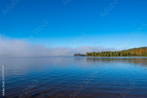 Morning Mist in Lake of Two Rivers in Algonquin Park  Ontario  Canada
