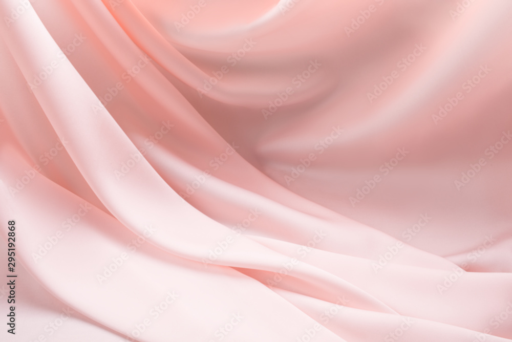 Obraz premium Silky light rose creamy ecru folded background