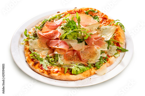  Italian Cuisine. Pizza with prosciutto, ham, arugula and parmesa