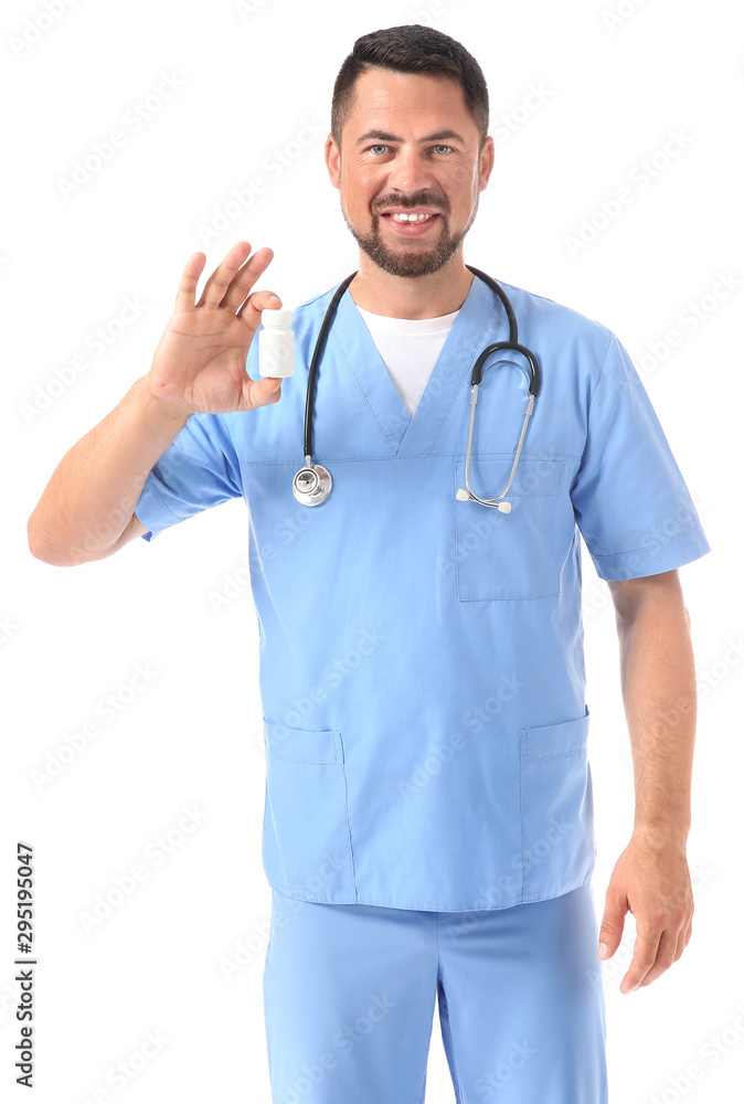Portrait of male doctor with pills on white background Portrait of male doctor with pills on white background