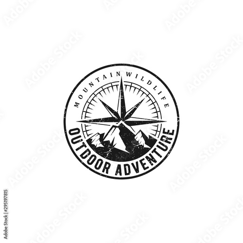 Vintage outdoor adventure logos with mountain elements and cardinal directions.