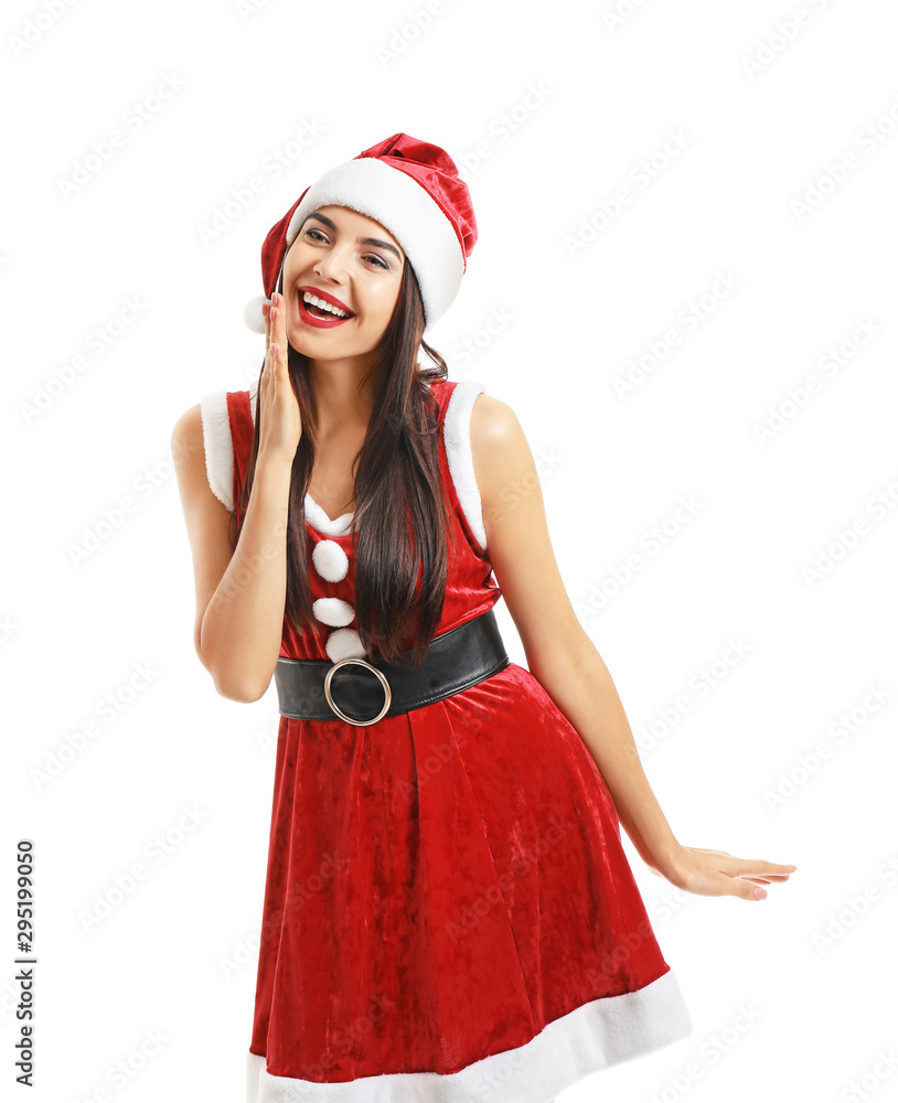 Beautiful young woman in Santa Claus costume on white background Beautiful young woman in Santa Claus costume on white background