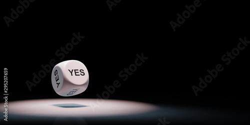 Yes Text Dice Spotlighted on Black Background