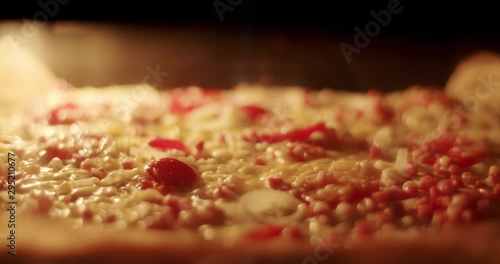 Close up time-lapse of an tarte flambee (Flammkuchen) baking in the oven. photo