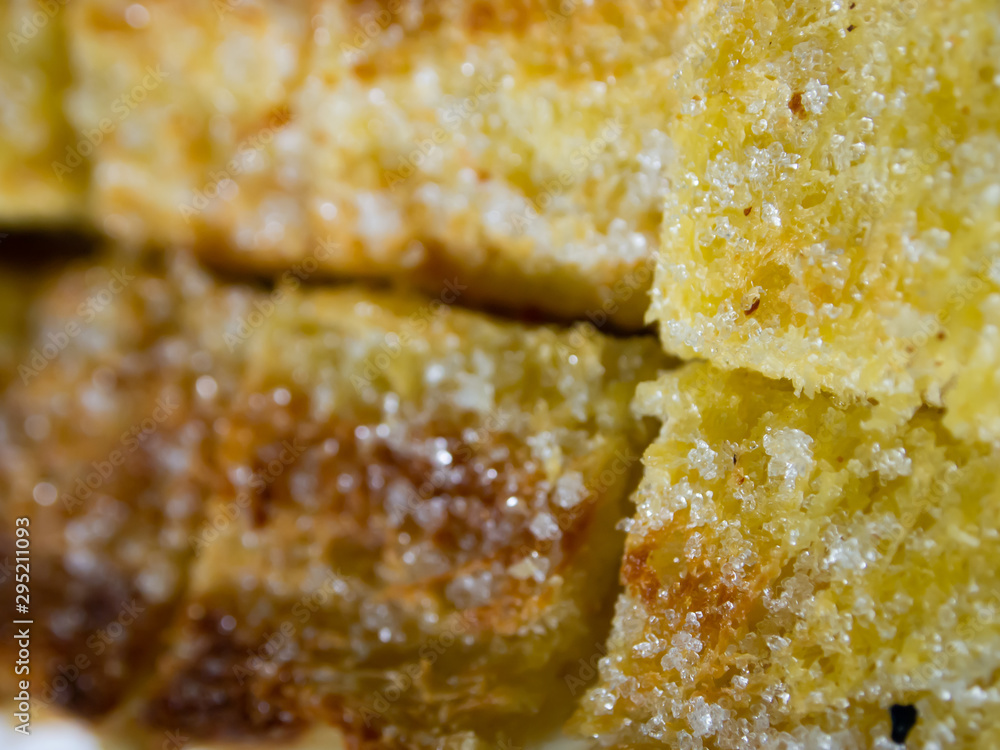 Toast bread butter and sugar, Close up and Macro shot, Selective focus, Snack food concept Toast bread butter and sugar, Close up and Macro shot, Selective focus, Snack food concept