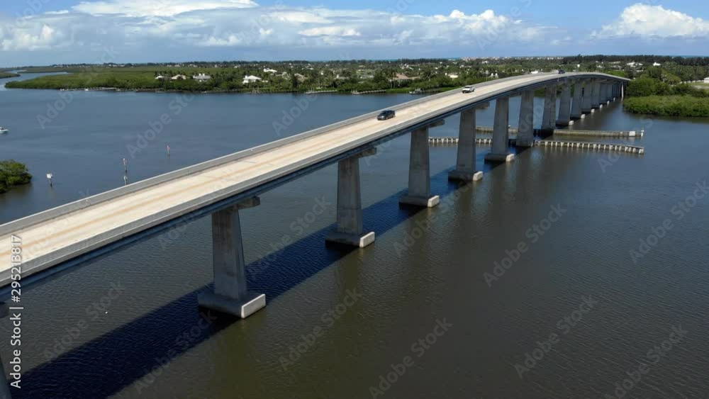 Aerial drone shot of a causeway on the Indian River Lagoon in Sebastian FL. Shot of a Beautiful summer day on the water in Florida. Aerial drone shot of a causeway on the Indian River Lagoon in Sebastian FL. Shot of a Beautiful summer day on the water in Florida.