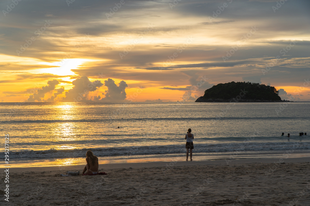 Kata Beach is a beautiful beach with white sand and smooth waves perfect for relaxing and swimming.. There is a unique Pu island close to Kata beach. Kata Beach is a beautiful beach with white sand and smooth waves perfect for relaxing and swimming.. There is a unique Pu island close to Kata beach.