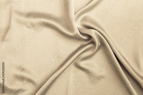 Abstract shiny vintage tone style fabric texture background, blank waving brown fabric pattern background