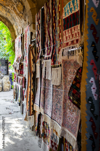 Street bazaar of ancient oriental handmade Garabagh, Tabriz, Shirvan style carpets, rugs at Old Town Baku, Azerbaijan