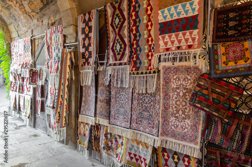 Street bazaar of ancient oriental handmade Garabagh, Tabriz, Shirvan style carpets, rugs at Old Town Baku, Azerbaijan