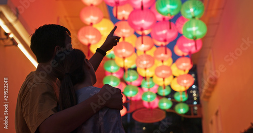 Asian couple look at the chinese lantern together