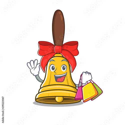 Shopping christmas bells placed above mascot door