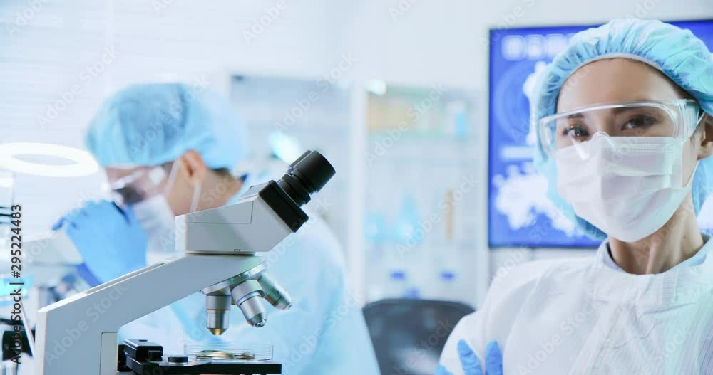 asian scientist use microscope asian scientist use microscope