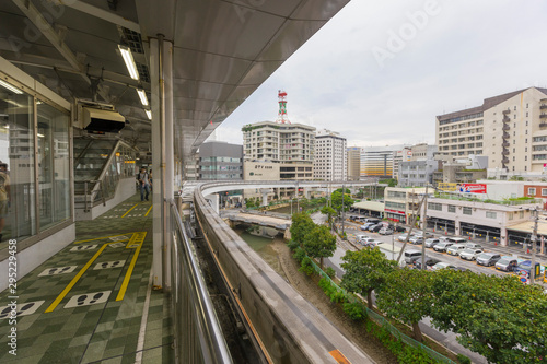 Yui Rail or Okinawa Urban Monorail approaching train station in Okinawa, Japan