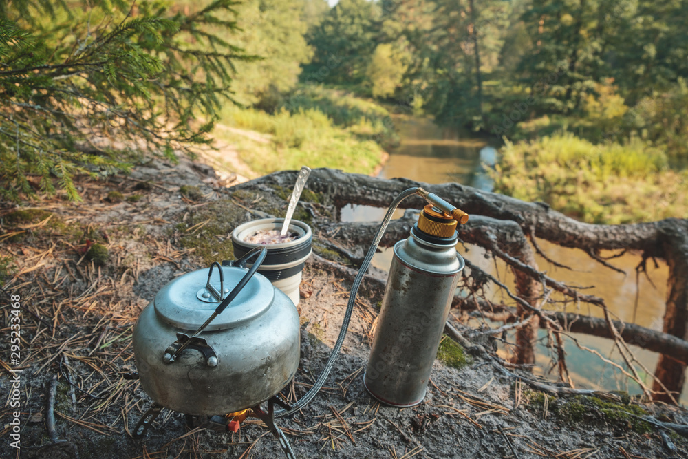 Coffee prepared with the gas burner in the forest. Coffee prepared with the gas burner in the forest.