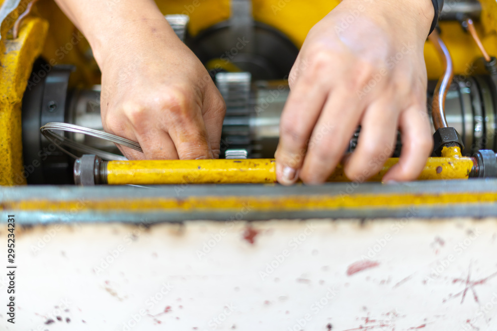 Preventive machine maintenance and retrofit in machine shop.Spindle shaft gear and bearing, parts in head stock of lathe machine. Preventive machine maintenance and retrofit in machine shop.Spindle shaft gear and bearing, parts in head stock of lathe machine.