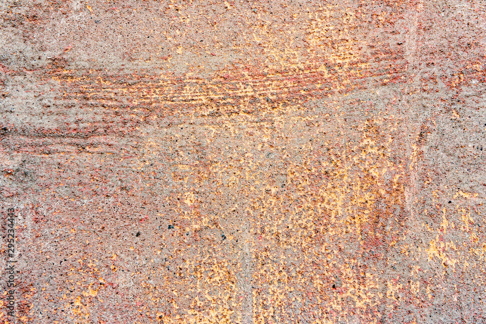 Texture of a concrete wall with cracks and scratches which can be used as a background Texture of a concrete wall with cracks and scratches which can be used as a background