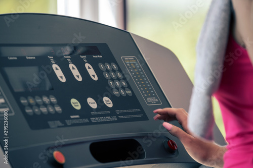 sportsman exercising on a treadmill at the gym