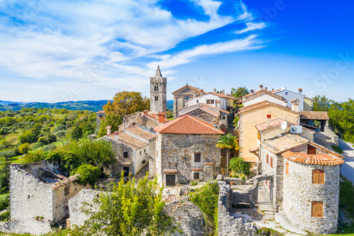 Old town of Hum on the hill, beautiful traditional architecture in Istria, Croatia, aerial view from drone