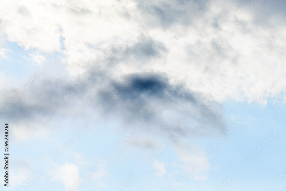 Beautiful puffy clouds isolated against blue skies Beautiful puffy clouds isolated against blue skies